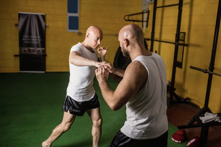 Collage of Krav Maga techniques being demonstrated